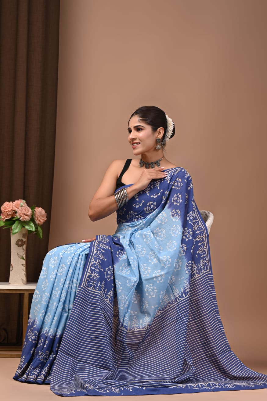 Natural shades cotton mul saree, lightweight and chic.