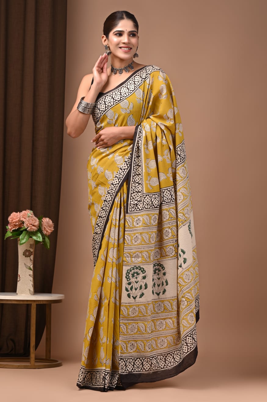 Feather-light cotton mul saree, breathable and stylish.