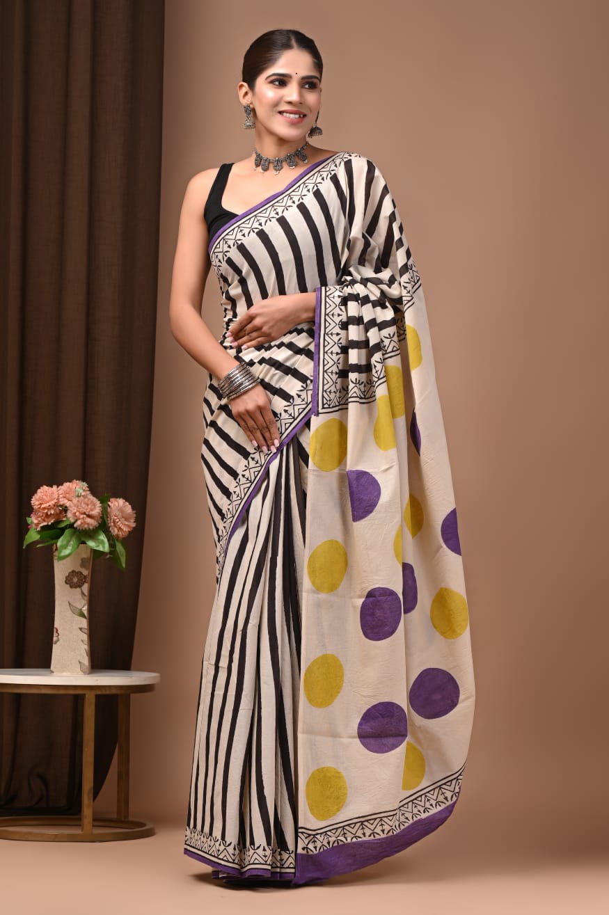 Authentic weave mulmul saree, elegant draping style.