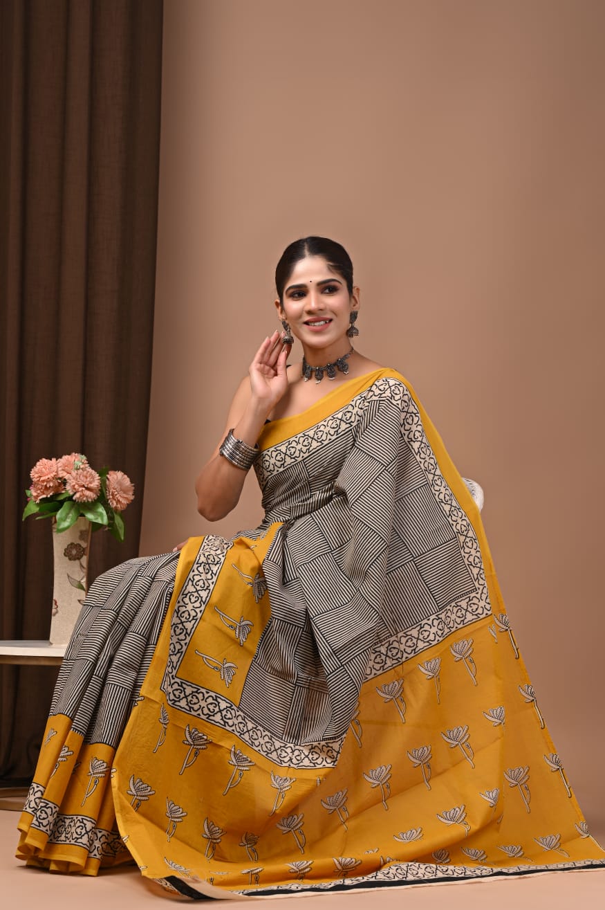 Everyday wearable cotton mul saree, breathable and soft.