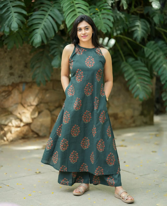 olive green cotton halter neck A-line kurta paired with matching palazzo