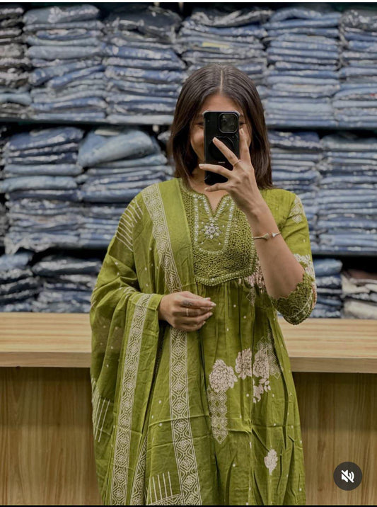 green embroidered cotton kurta set with a printed dupatta