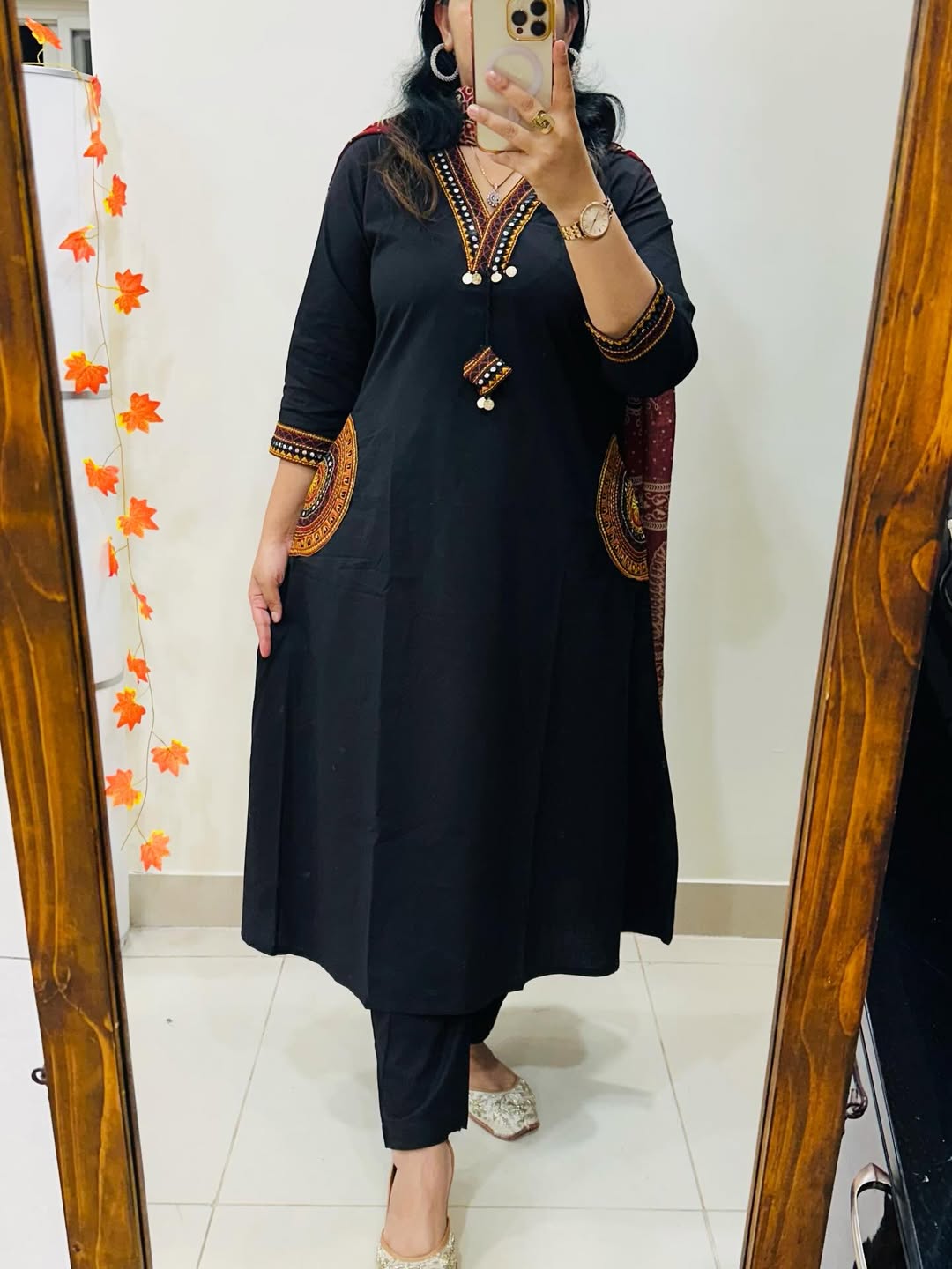black cotton A-line kurta, pant, and dupatta set