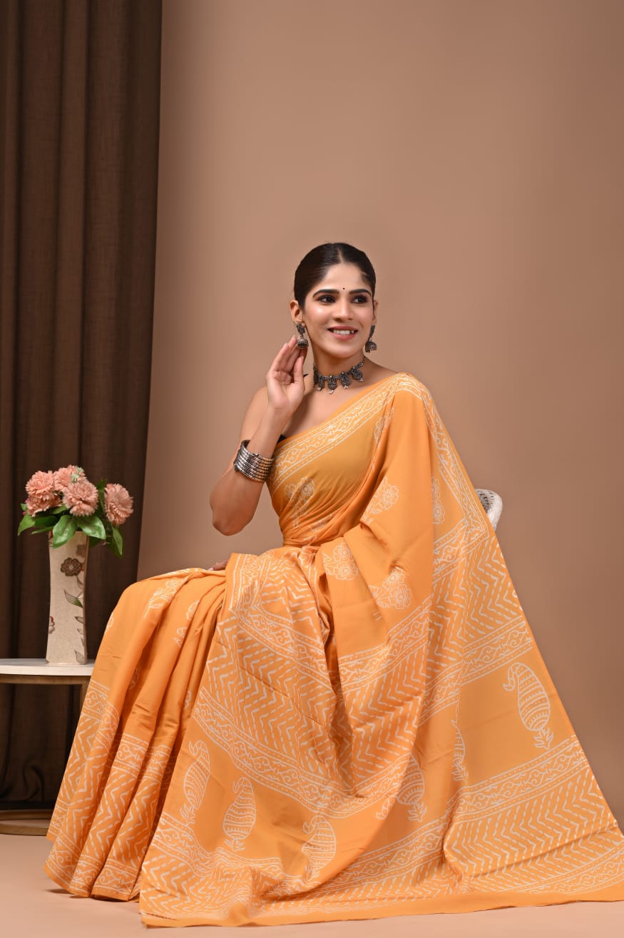 Heritage cotton mul saree with timeless drape appeal.