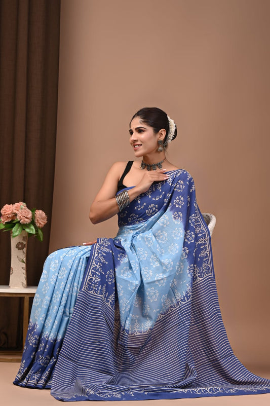 Natural shades cotton mul saree, lightweight and chic.