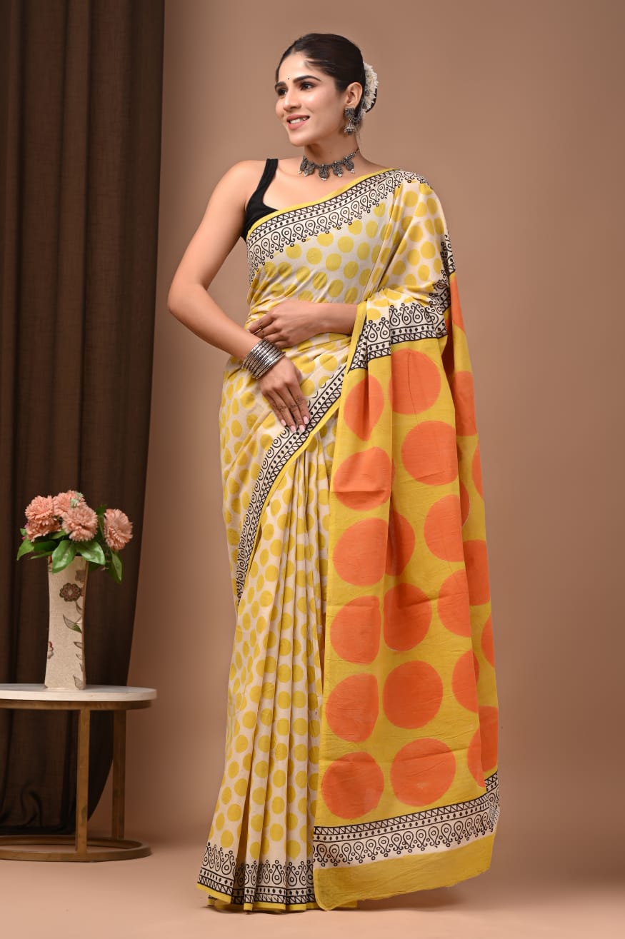 Lightweight cotton saree in mulmul, subtle charm.