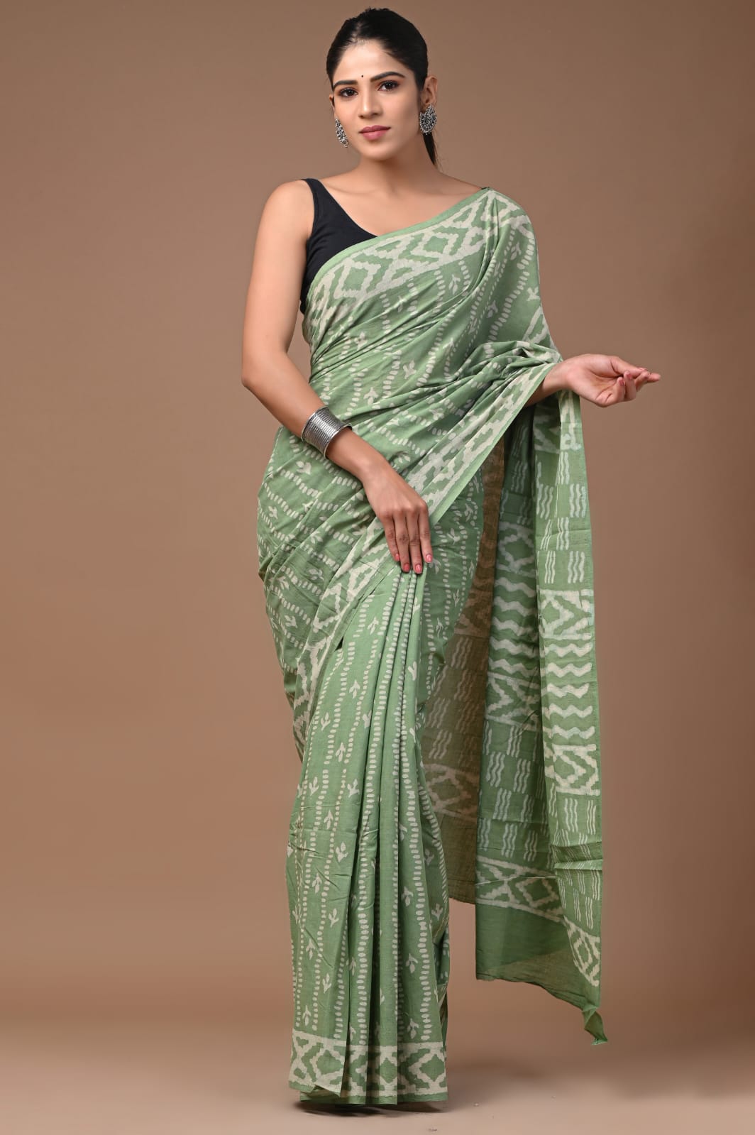 Luxurious comfort pure mulmul saree, graceful for all occasions.