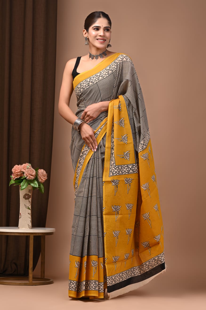 Artisan-made cotton mul saree with block printing.