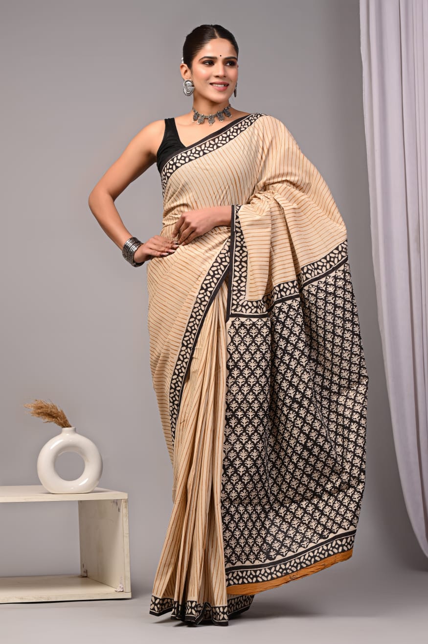 Summer-perfect cotton mulmul saree with blouse piece.