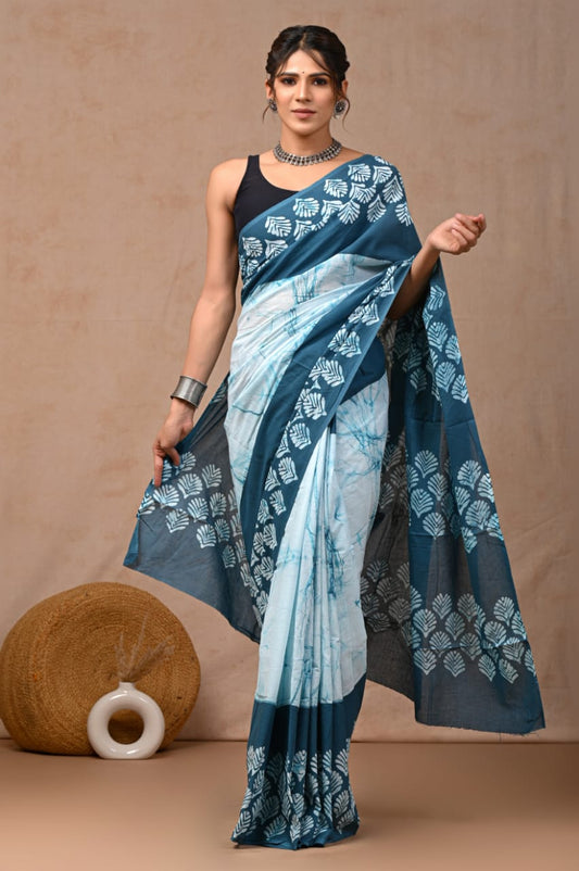 Natural shades cotton mul saree, lightweight and chic.