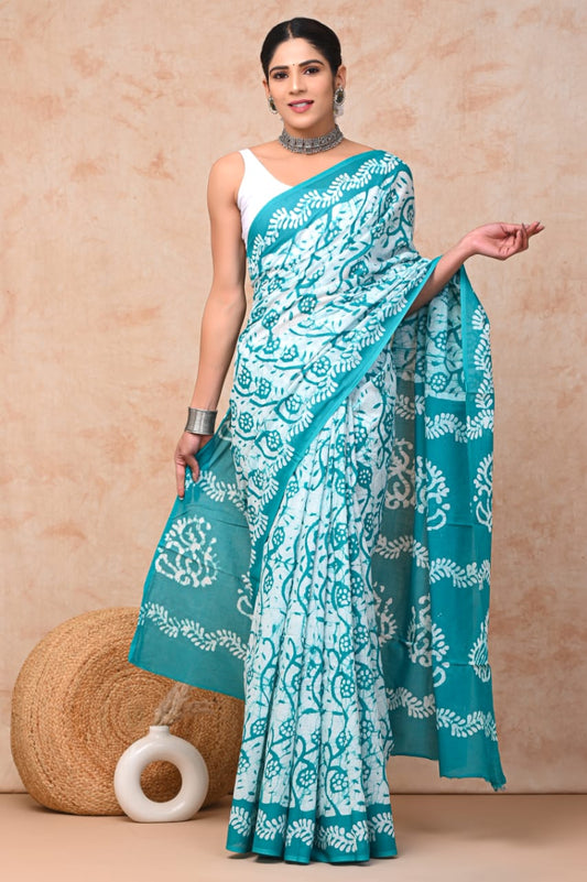 Flowy cotton mulmul saree with block printed detailing.