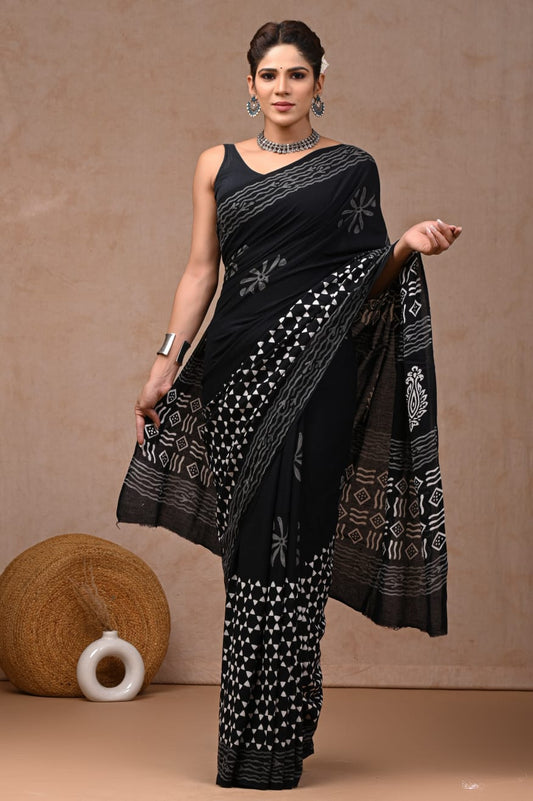 Artisan-inspired cotton saree with mulmul drape.