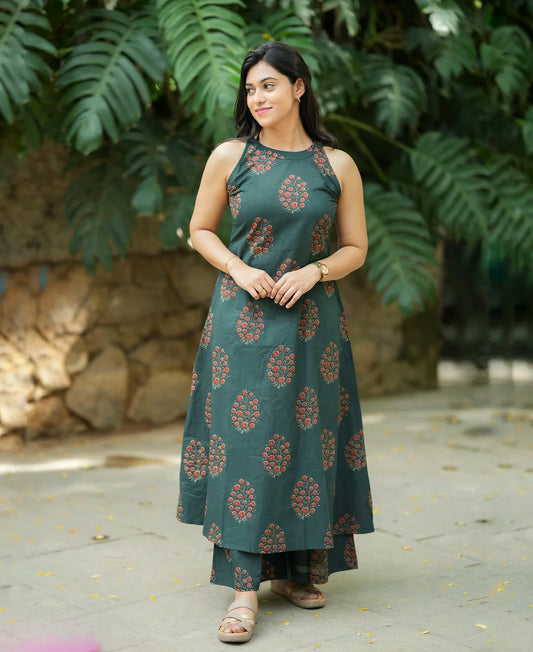 olive green cotton halter neck A-line kurta paired with matching palazzo