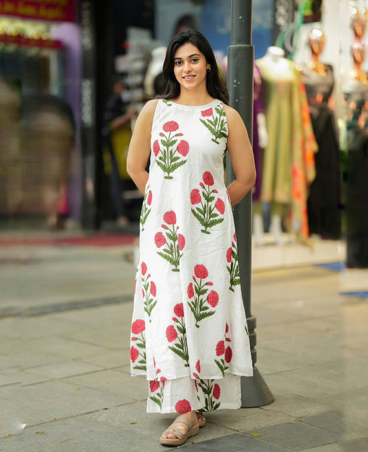 white and pink floral printed cotton halter neck kurta and palazzo set