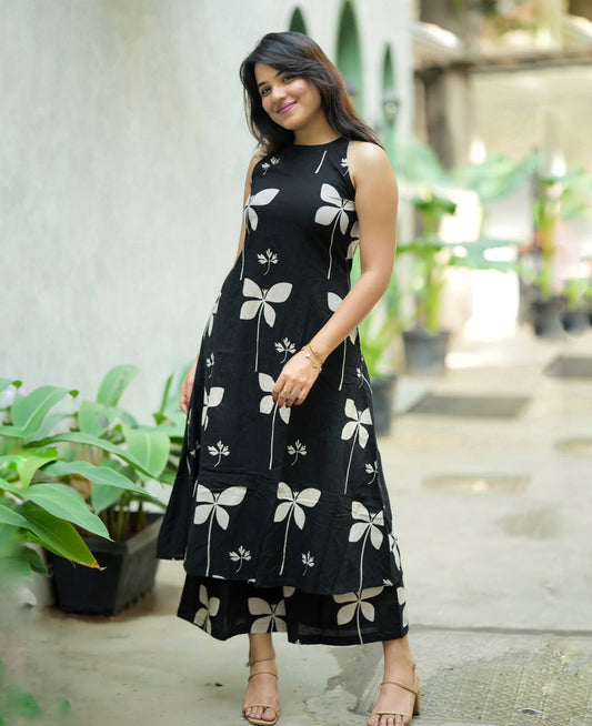 black and white floral printed sleeveless A-line kurta and palazzo set