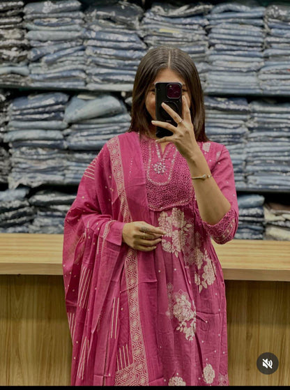 pink printed Anarkali kurti featuring white floral patterns and embroidered