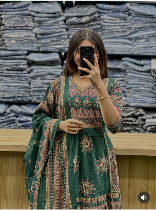 green printed cotton kurta pant set with a matching dupatta