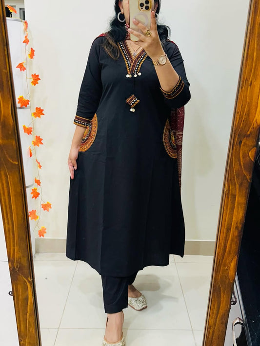 black cotton A-line kurta, pant, and dupatta set