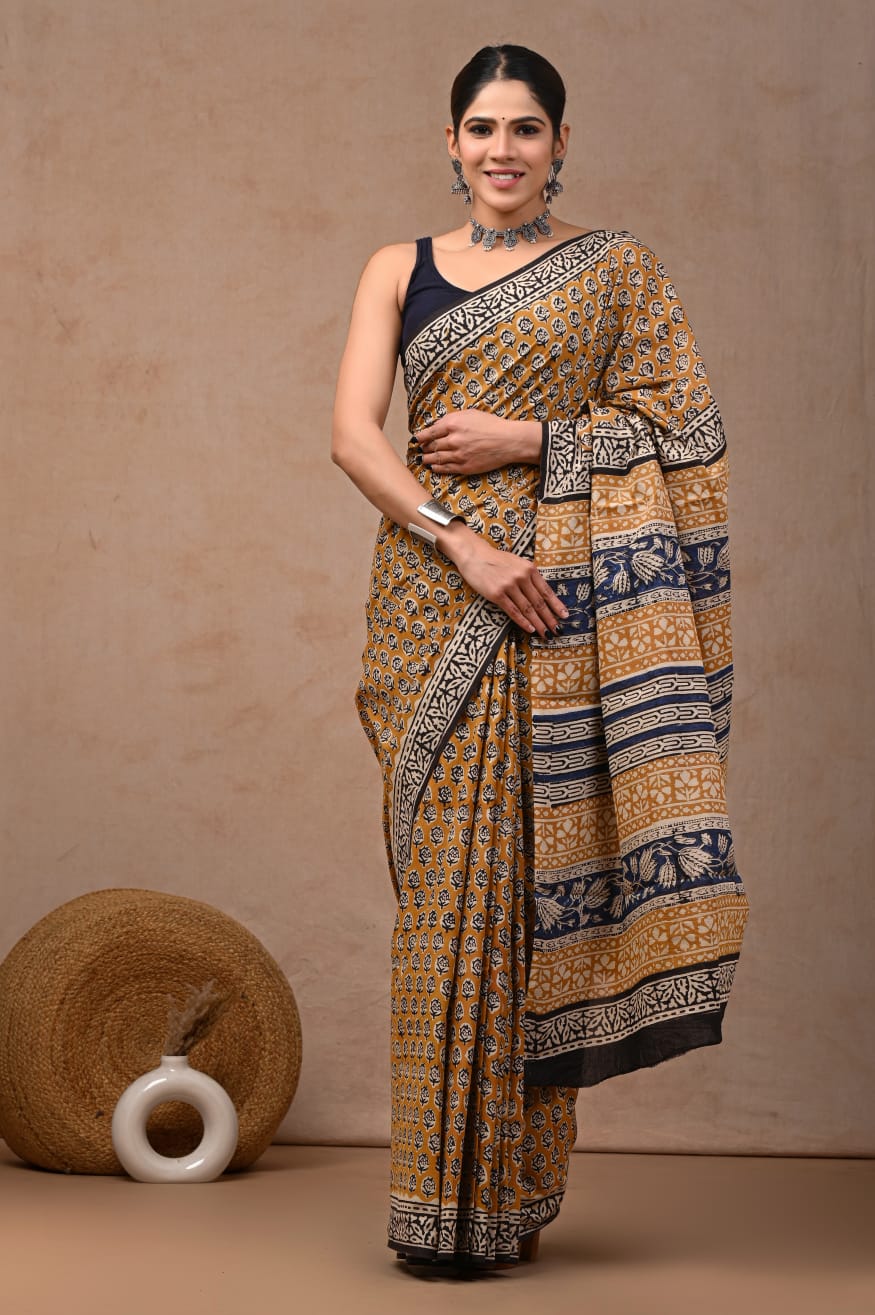 Everyday elegance cotton saree with breathable mulmul fabric.