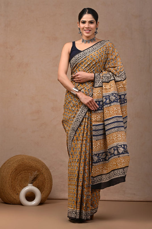 Everyday elegance cotton saree with breathable mulmul fabric.