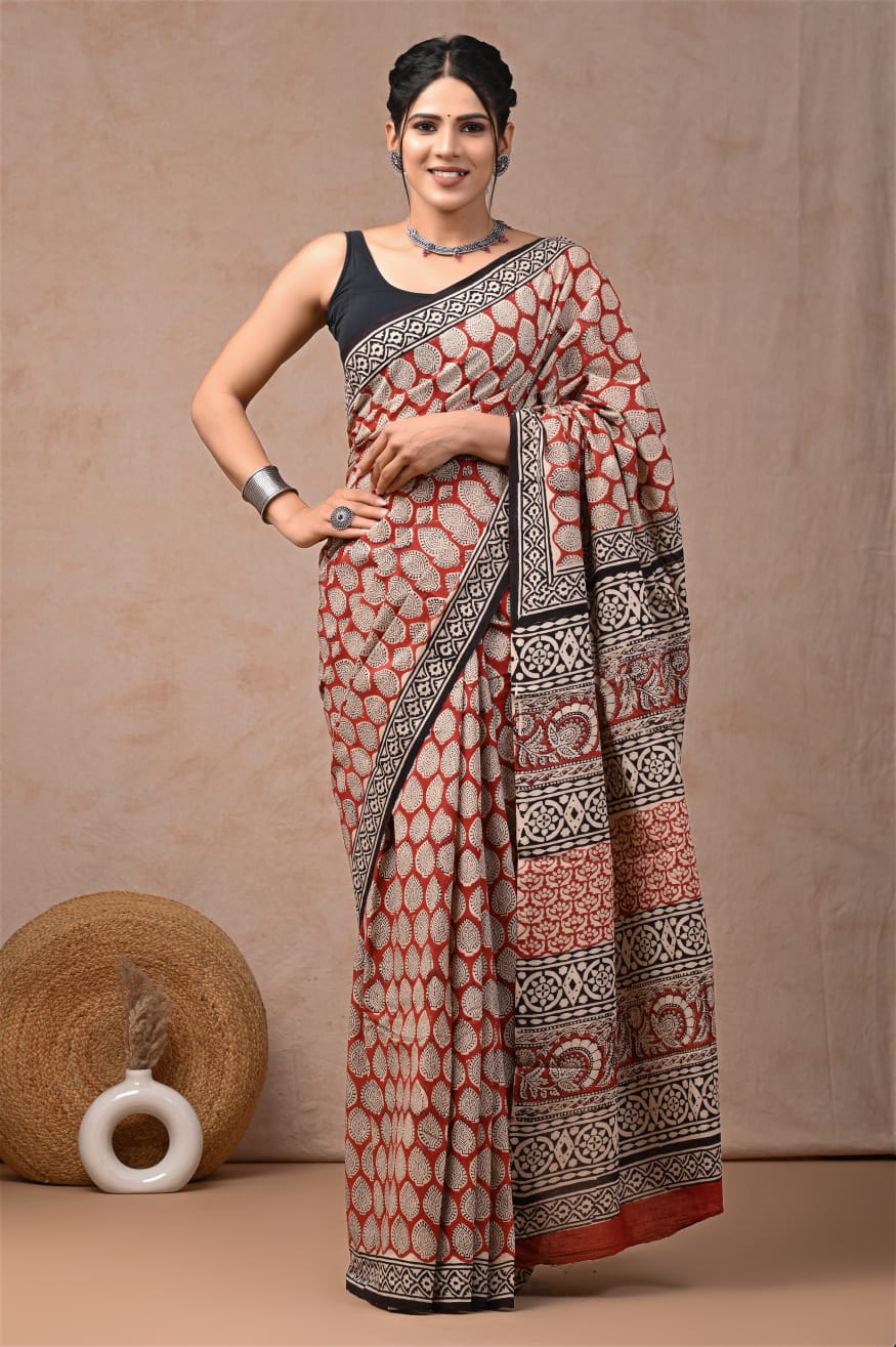 Soft-touch mulmul saree in pure cotton, crafted for modern elegance.