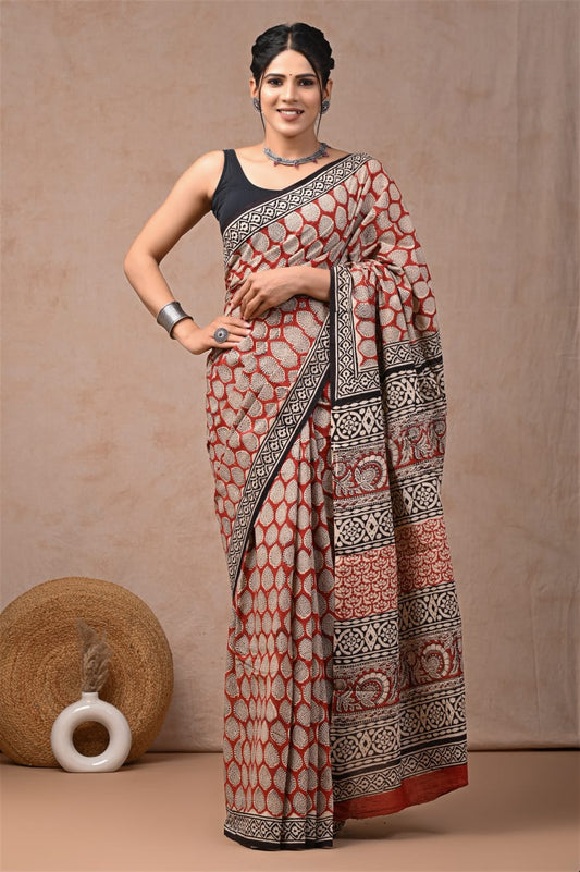 Soft-touch mulmul saree in pure cotton, crafted for modern elegance.