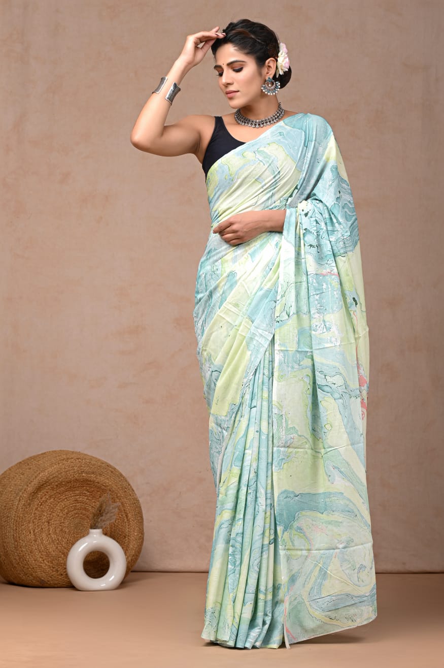 Feather-soft mul saree, made with authentic cotton.