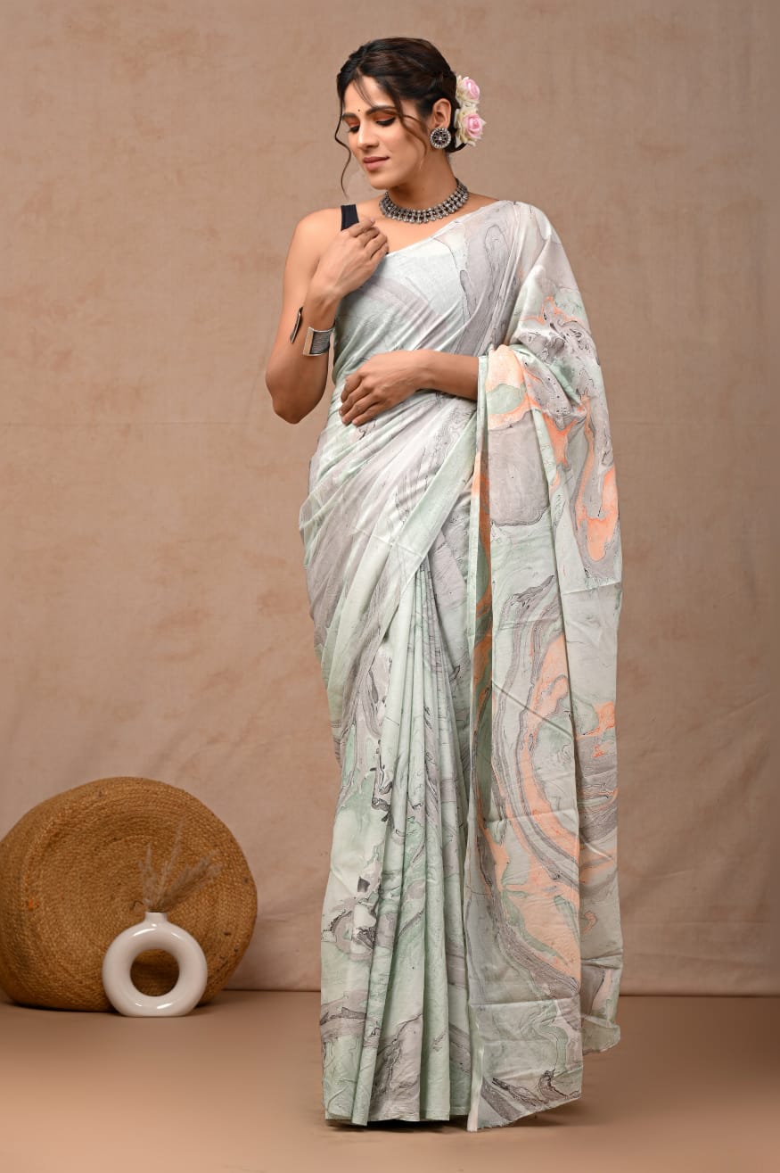 Chic handloom mul cotton saree for festive grace.