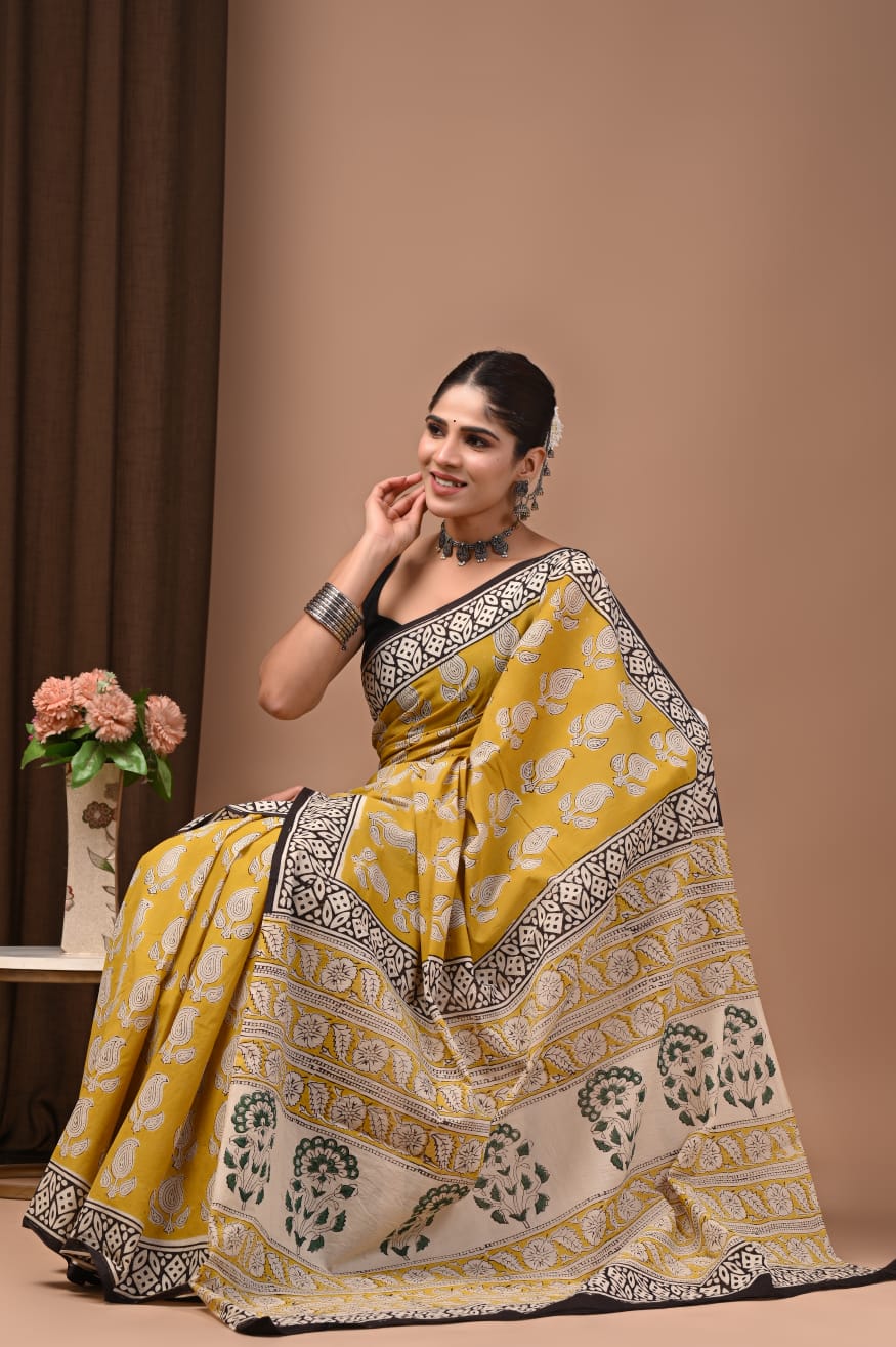 Pure handloom cotton mul saree for effortless elegance.